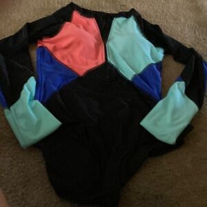 One piece  zip front women’s long sleeve swimsuit front and back Never Worn